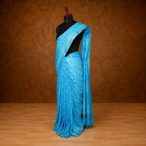 Sky Blue Saree with Golden Border, Printed with Batik Design