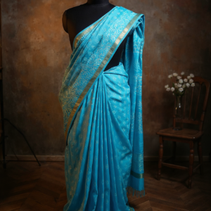Sky Blue Saree with Golden Border, Printed with Batik Design